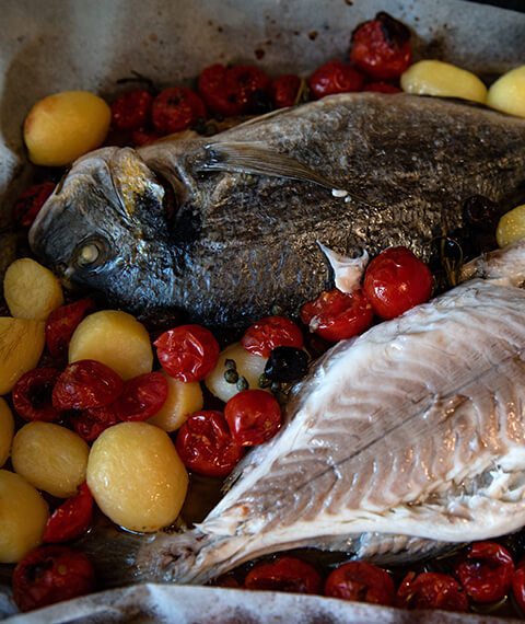 Baked sea bream fillet with cherry tomato confit